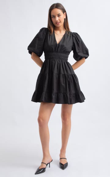Shop our Cotton Puff Sleeve Short Tier Dress in Black | Pagani Shop our Cotton Puff Sleeve Short Tier Dress in Black | Pagani