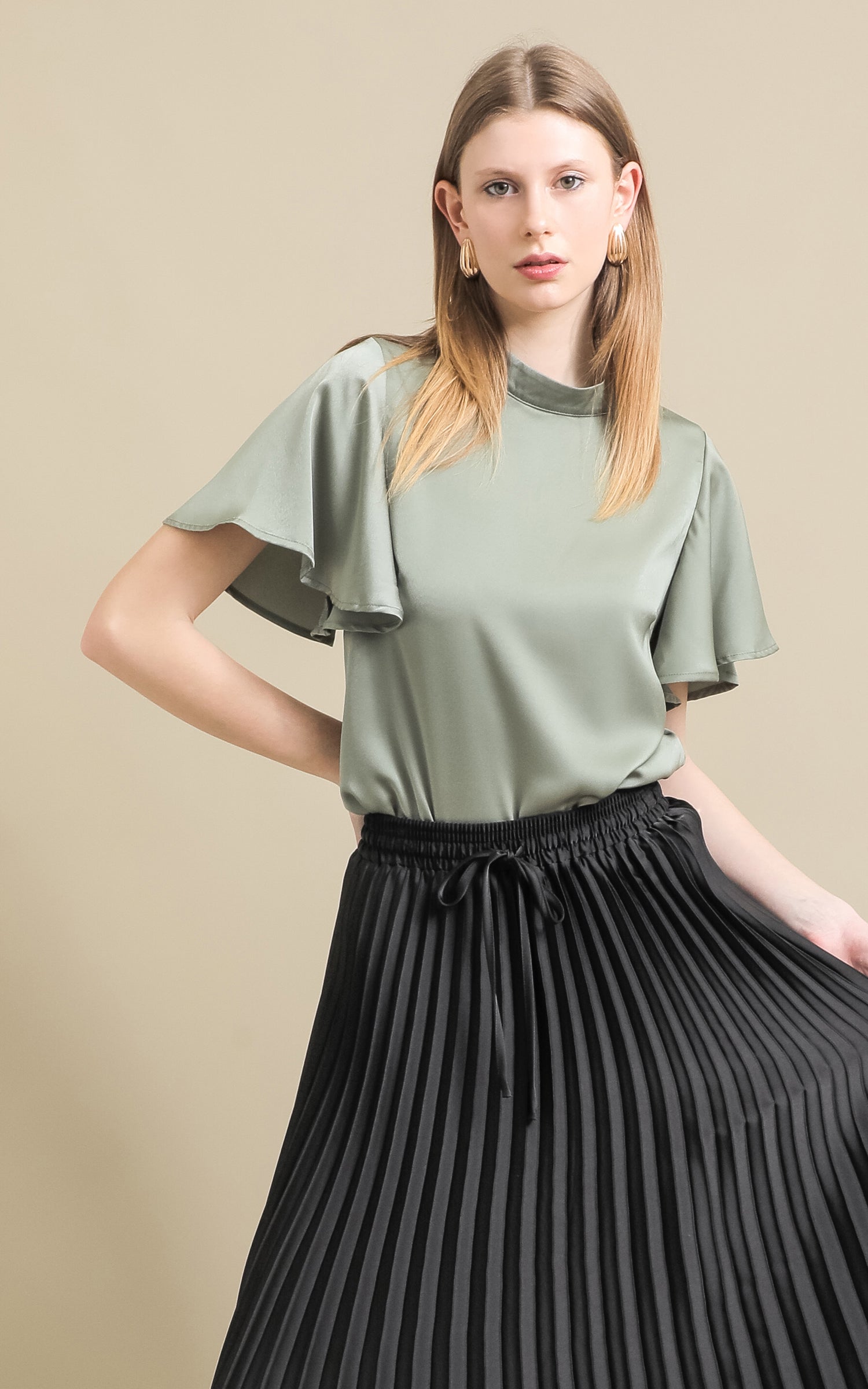 Shop our Peached Satin High Neck Top in Sage Pagani