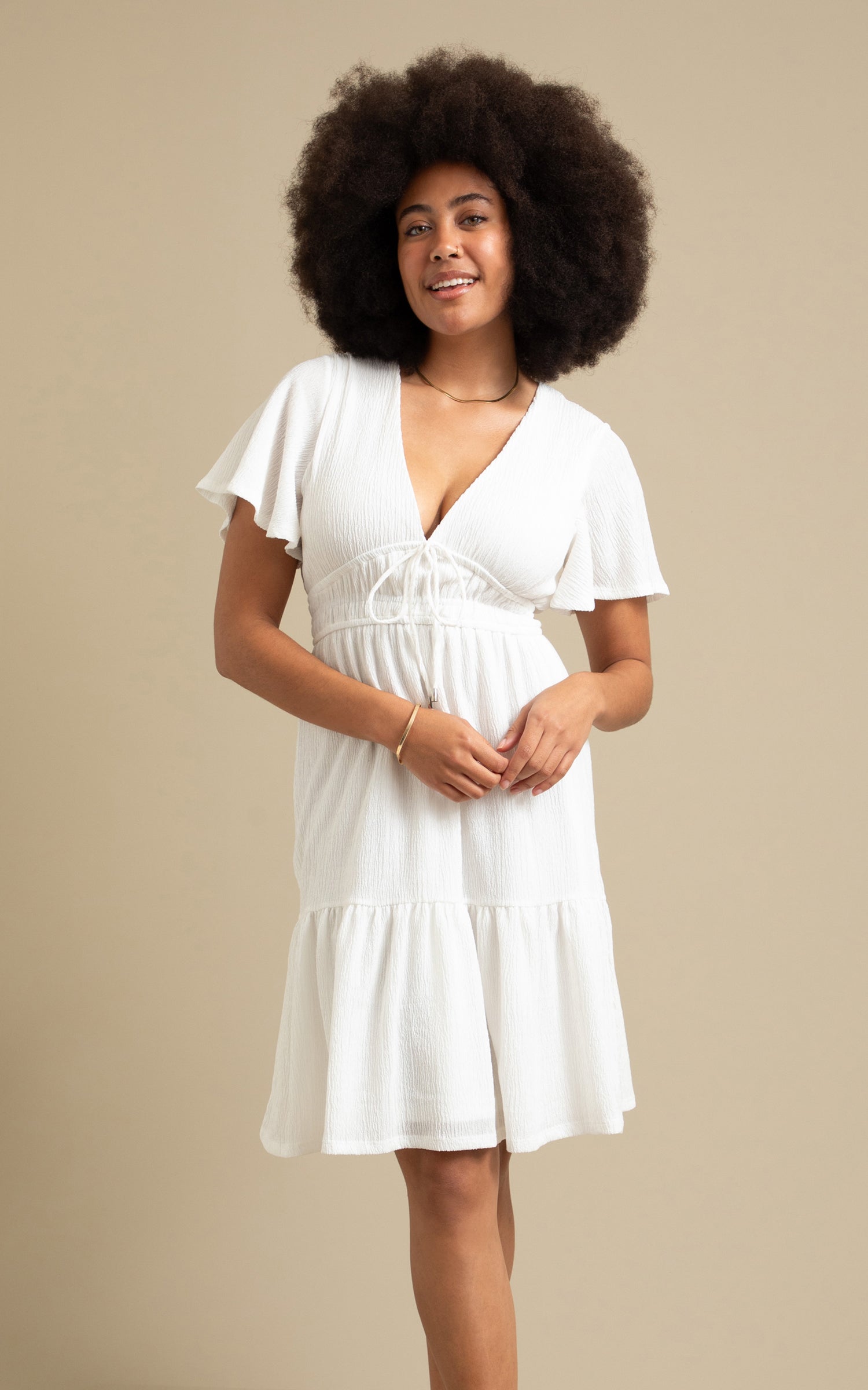 Shop our Textured Jersey Tie Front Dress in Cream | Pagani