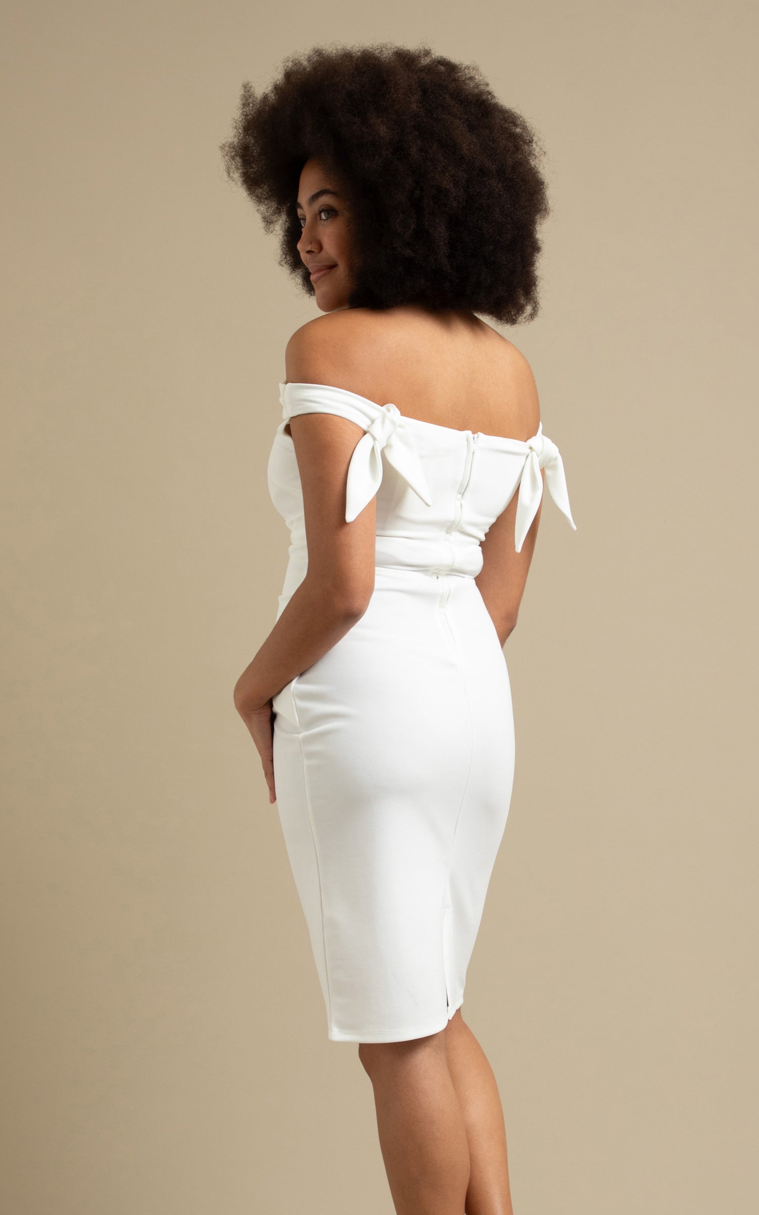 Shop our Textured Scuba Tie Shoulder Dress in Cream | Pagani