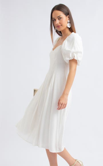 wedding dress long sleeve minimalist fit and flare wedding dress with long sleeve  La Novale Atelier